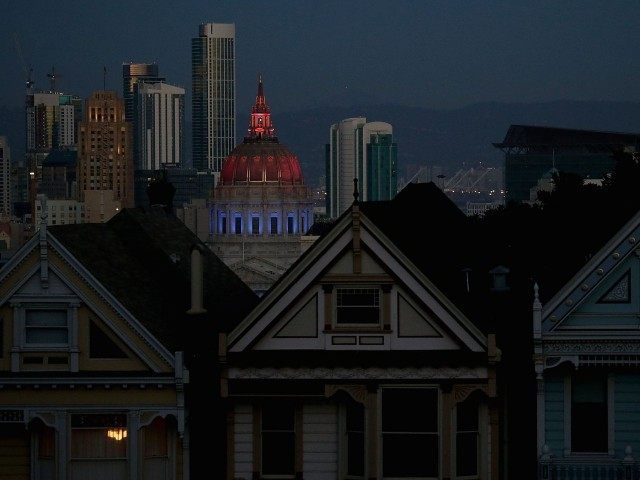 San Francisco City Hall and Paris (Justin Sullivan / Getty)