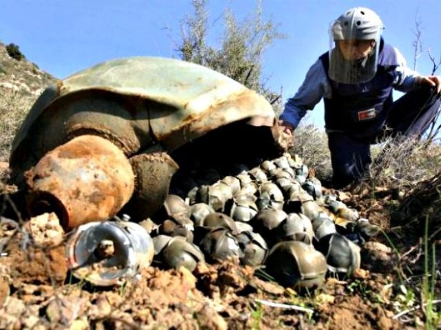 Syrians Drop Cluster Bombs on Civilians Mohammed Zaatar AP