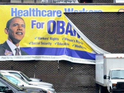 Torn Healthcare, Obama Sign AP