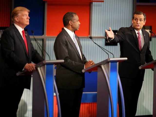epublican presidential candidate Donald Trump (L) and Ben Carson (C) looks on as U.S. Sen. Ted Cruz (R-TX) speaks during the Republican Presidential Debate sponsored by Fox Business and the Wall Street Journal at the Milwaukee Theatre on November 10, 2015 in Milwaukee, Wisconsin. The fourth Republican debate is held …