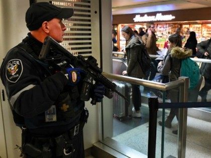 mtrak Police officer watches passengersas they board a train at Penn Station on November 24, 2015 in New York. After a string of terror attacks in several countries, the US government issued a worldwide travel alert warning American citizens of 'increased terrorist threats'. AFP PHOTO / TIMOTHY A. CLARY / …