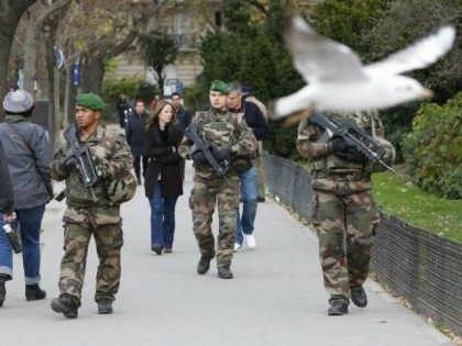 French military patrol near the Eiffel Tower the day after …