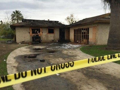 Fatal House Fire in Fresno (Paul Schlesinger/The Fresno Bee via AP)