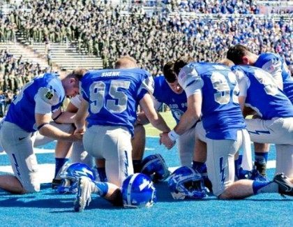 Air Force Football Players Kneel Before Game