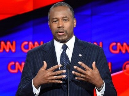 Republican presidential candidate retired neurosurgeon Ben Carson gestures as he speaks du