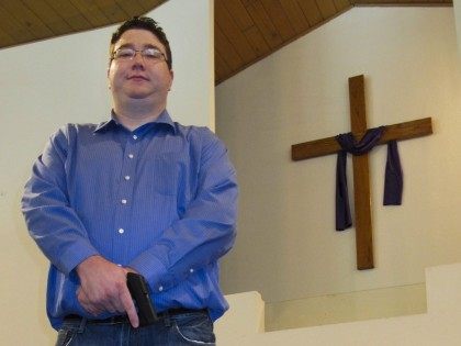 Conceal carry pastor (Jim Suhr : Associated Press)