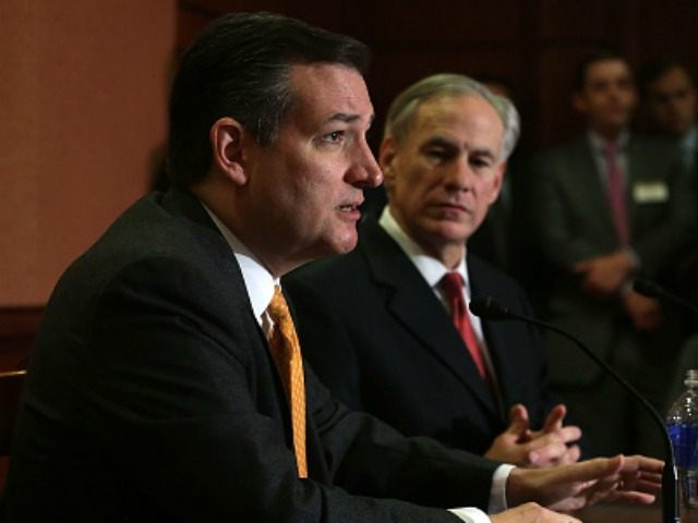 Republican presidential candidate Sen. Ted Cruz (R-TX) (L) and Texas Governor Greg Abbott (R) participate in a news conference December 8, 2015 on Capitol Hill in Washington, DC. Sen. Cruz will introduce legislation addressing the Obama Administration's effort to resettle Syrian refugees in the United States. (Photo by