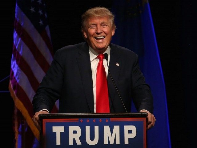 Donald Trump laughs (Justin Sullivan / Getty)