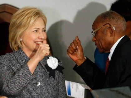 Democratic presidential candidate Hillary Clinton greets and gives a thumbs-up to Fred Gra