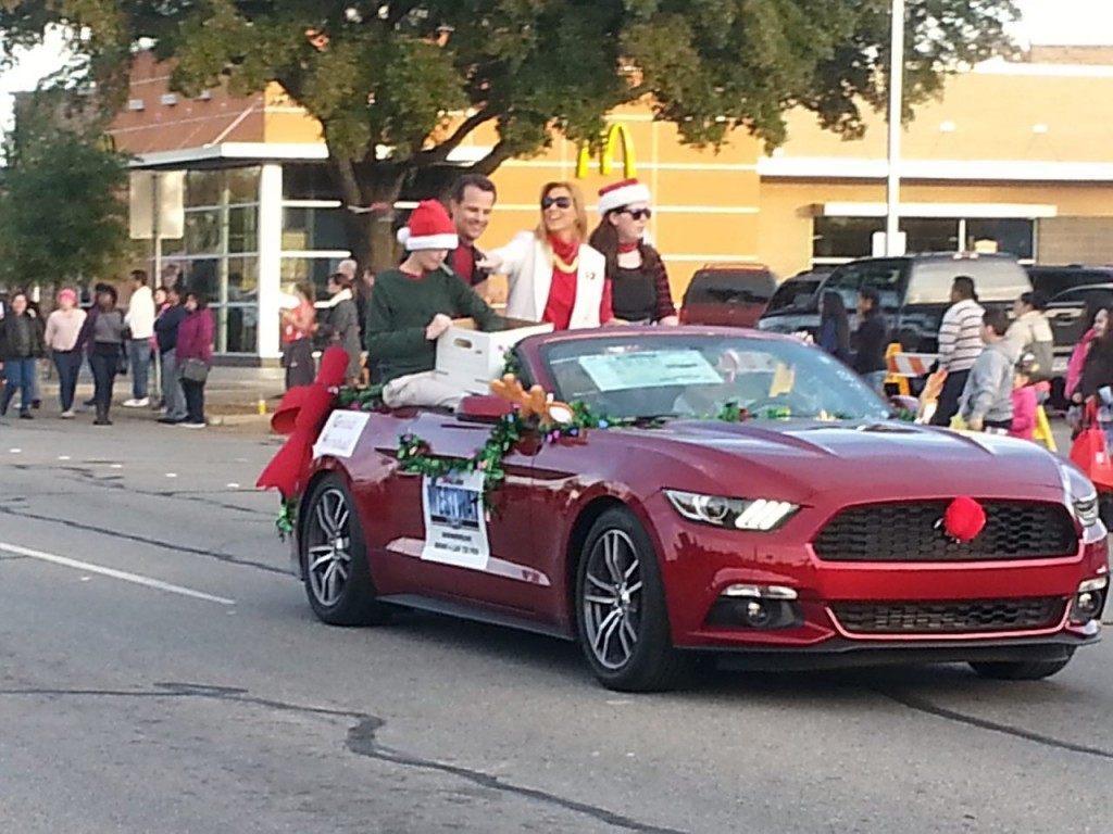 Irving Mayor Beth Van Duyne rides as Grand Marshall in Christmas  parade. (Breitbart Texas Photo by Merrill Hope)