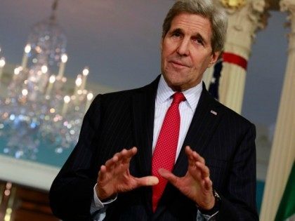 Secretary of State John Kerry talks to the media at the State Department in Washington on December 16, 2015. AFP PHOTO/YURI GRIPAS / AFP / YURI GRIPAS (Photo credit should read