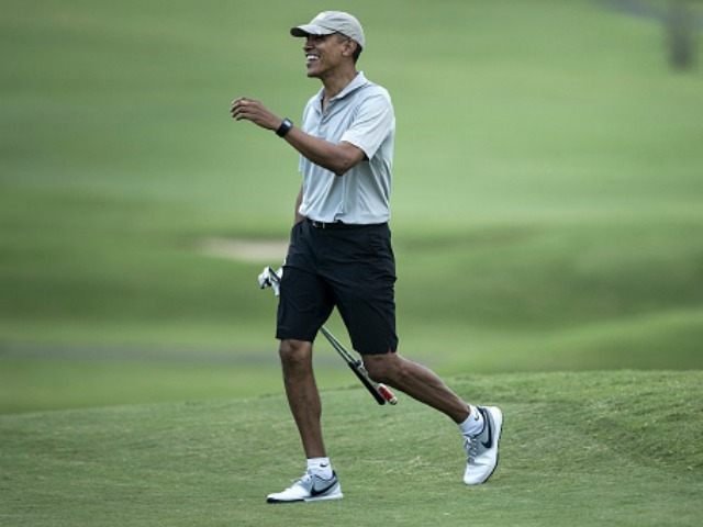 Obama arrives on the 18th hole of the Mid-Pacific Country Club's golf course December