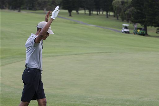 Obama raises hands AP