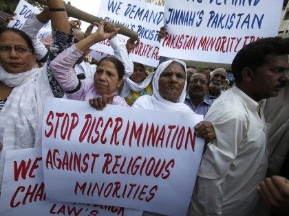 Protesters hold up placards while demanding the release of Asia Bibi, a Pakistani Christian sentenced to death for blasphemy in Karachi