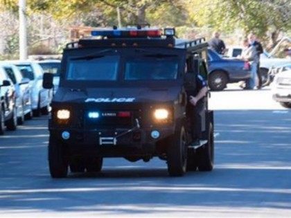 A swat team arrives at the scene of a shooting in San Bernardino, Calif., on Wednesday, Dec. 2, 2015. Police responded to reports of an active shooter at a social services facility. ( MANDATORY CREDIT