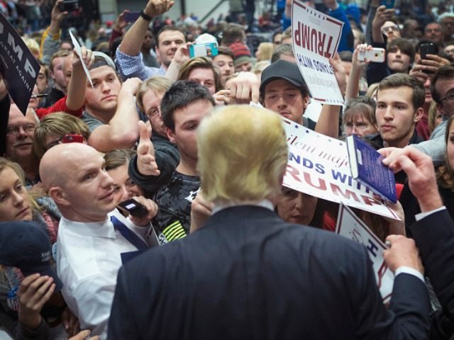 Republican presidential candidate Donald Trump greets guests at a campaign rally on Decemb