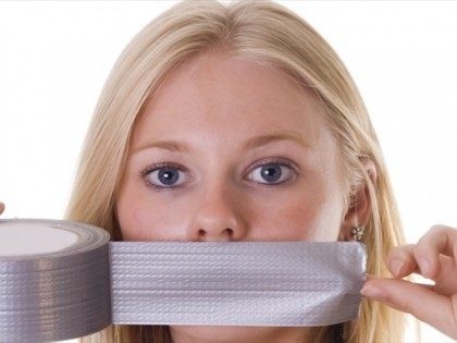 Woman-tapes-her-mouth-with-duct-tape-Shutterstock-800x430