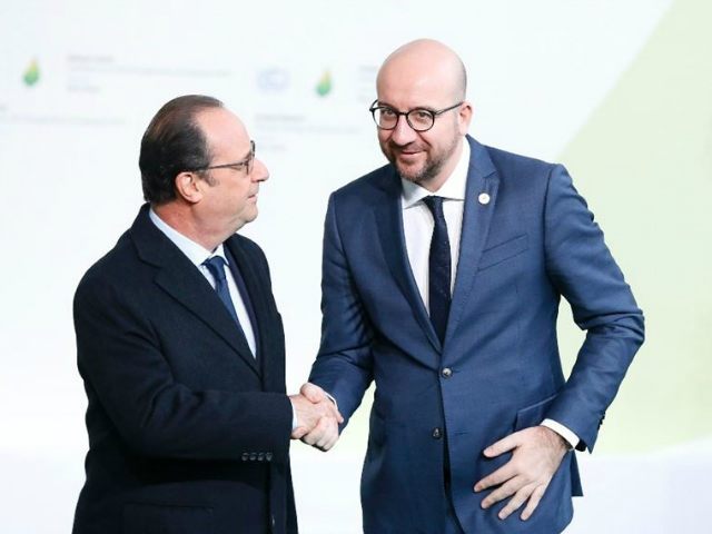 French president Francois Hollande (L) greets Belgium prime minister Charles …