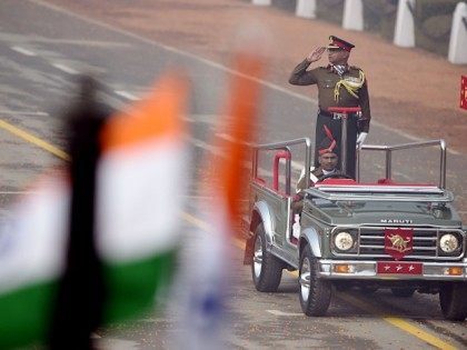 Indian Army Lieutenant General Rajan Ravindran salutes as he participates in India's Republic Day parade in New Delhi on January 26, 2016. Thousands gathered in New Delhi amid tight security January 26 for India's annual Republic Day parade, a pomp-filled spectacle of military might featuring camels and daredevil stuntwomen, with …