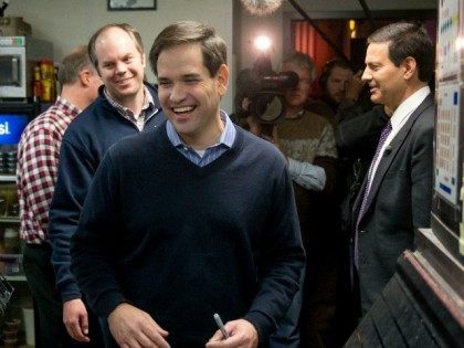 Republican presidential candidate Sen. Marco Rubio, R-Fla., departs through the kitchen af