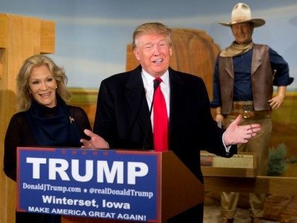 Republican presidential candidate Donald Trump, joined by John Wayne's daughter, Aissa Wayne, speaks during a news conference at the John Wayne Museum, Tuesday, Jan. 19, 2016, in Winterset, Iowa.