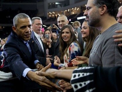 President Barack Obama greets people in the audience after speaking at University of Nebraska-Omaha, in Omaha, Neb., Wednesday, Jan. 13, 2016. After giving his State of the Union address, he is in Omaha, Neb., to tout progress and goals in his final year in office.