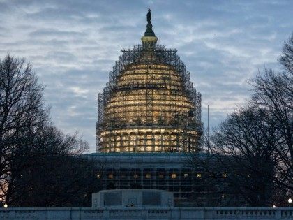 The Capitol Dome in Washington is illuminated early, Tuesday, Jan. 12, 2016.