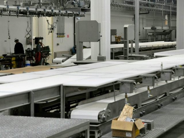 In this April 2, 2012 file photo, employees continue work inside the Northern Beef Packers
