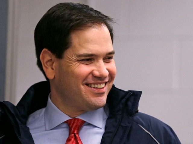 Republican presidential candidate, Sen. Marco Rubio, R-Fla. smiles as he arrives for a cam