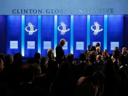 Former U.S. President walks off stage at the conclusion of the Clinton Global Initiative 2