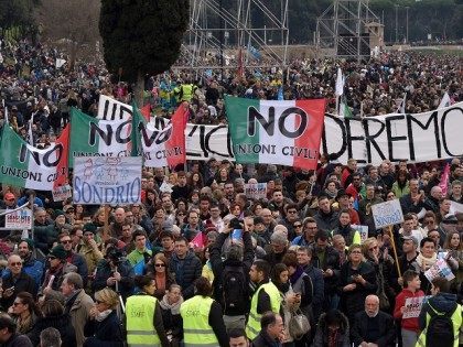 Thousands of demonstrators holding banners reading "no to the civil unions", tak