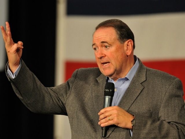 Republican presidential candidate Mike Huckabee speaks at the Growth and Opportunity Party