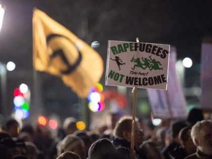 LEIPZIG, GERMANY - JANUARY 11: Supporters of the right-wing populist group Pegida march on the first anniversary of its Leipzig affiliate, called Legida, on January 11, 2016 in Leipzig, Germany. Pegida and other right-wing activists have been quick to latch on to the New Year's Eve sex attacks in Cologne. …