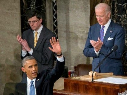Barack Obama, front, waves as he arrives to deliver the State of the Union address to a joint session of Congress while U.S. Vice President Joseph 'Joe' Biden, second right, and U.S. House Speaker John Boehner, a Republican from Ohio, right, applaud at the Capitol in Washington, D.C., U.S., on …