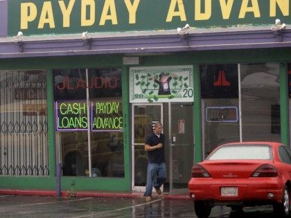 Payday loans (Lenny Ignelzi / Associated Press)