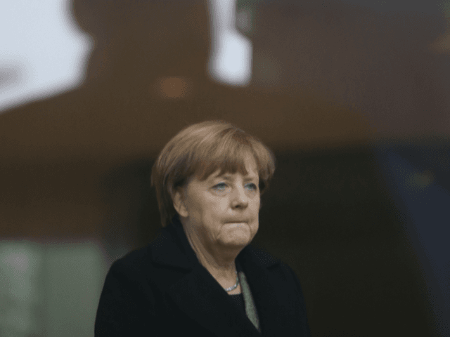 German Chancellor Angela Merkel worried / sad