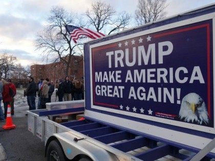 People line up to attend a Donald Trump campaign rally raising funds for US military veter