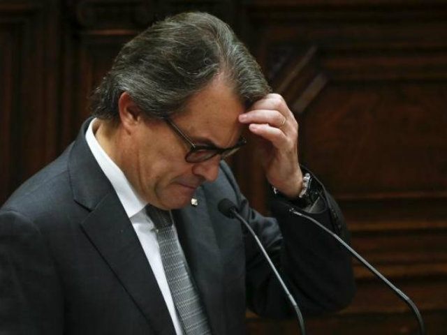 Catalan acting President Artur Mas gestures during an election session …