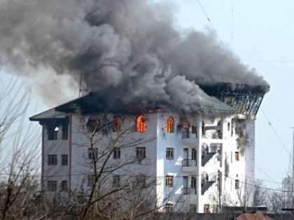 INDIA, KASHMIR : PAMPORE, KASHMIR-INDIA FEBRUARY 22: Fire engulfs government building afte