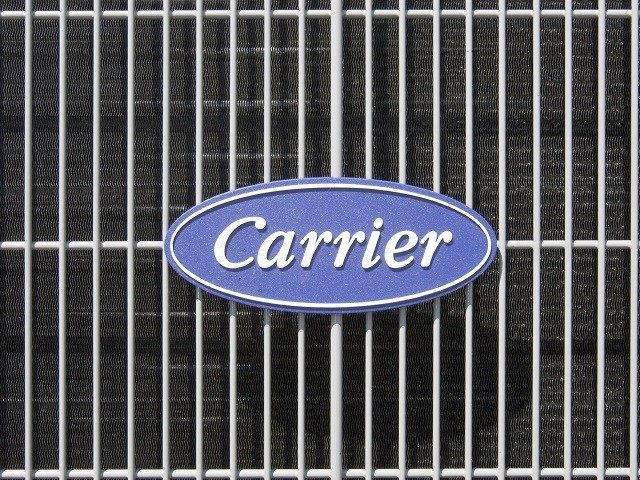 An air conditioner bears the Carrier logo in Omaha, Neb., Tuesday, April 21, 2009. United