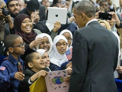 President Barack Obama stops to greets children from Al-Rahmah school and other guests dur