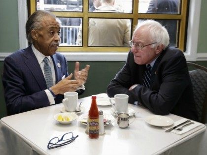 The Rev. Al Sharpton, left, talks with Democratic presidential candidate Sen. Bernie Sanders, I-Vt. as they sit down for a breakfast meeting at Sylvia's Restaurant, Wednesday, Feb. 10, 2016, in the Harlem neighborhood of New York. Sanders defeated former Secretary of State Hillary Clinton on Tuesday in the New Hampshire …