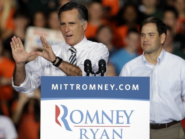 Mitt Romney, accompanied by Sen. Marco Rubio, R-Fl at the University of Miami, Wednesday, Oct. 31, 2012, in Coral Gables, Fla.
