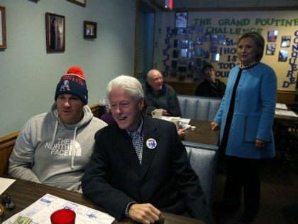 MANCHESTER, NH - FEBRUARY 08: Democratic presidential candidate former Secretary of State Hillary Clinton (R) and her husband, former U.S. president Bill Clinton, greet patrons at Chez Vachon on February 8, 2016 in Manchester, New Hampshire. With one day to go before the New Hampshire primaries, Hillary Clinton continues to …