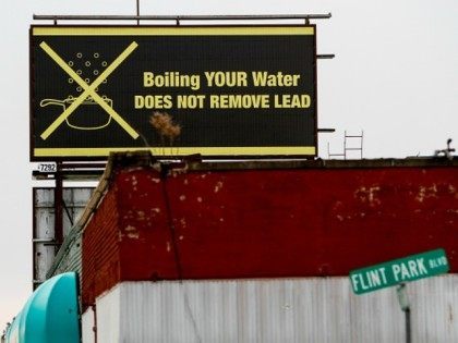 A sign tells Flint residents that boiling water doesn't remove lead on February 7, 2016 in Flint, Michigan.