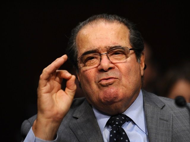 US Supreme Court Justice Antonin Scalia speaks as he along with Justice Stephen Breyer testify before the Senate Judiciary Committee at a hearing entitled, ?Considering the Role of Judges Under the Constitution of the United States" at the Hart Senate Office Building in Washington, DC, on October 5, 2011. AFP …