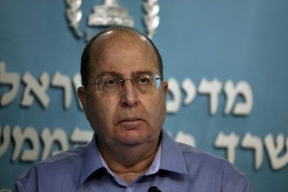 Israeli Defence Minister Moshe Yaalon pauses during a press conference at the prime minister's office in Jerusalem, on August 27, 2014.