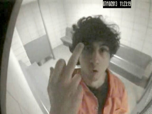 BOSTON, MA - JULY 10, 2013: In this handout image of security footage provided by the United States Attorneys Office, Boston Marathon bomber Dzhokhar Tsarnaev is seen giving the middle finger to a security camera inside his jail cell three months after he was arrested in the terror attack July …