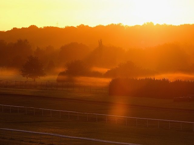 DONCASTER, ENGLAND - SEPTEMBER 26: Mist shrouds the back straight of Doncaster Racecourse