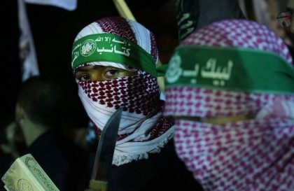 Supporters of the Islamist movement Hamas gather during a rally in support of felllow Palestinians following clashes between Palestinians and Israeli police at Jerusalem's flashpoint Al-Aqsa mosque compound and the West Bank, on October 5, 2015, in Gaza City